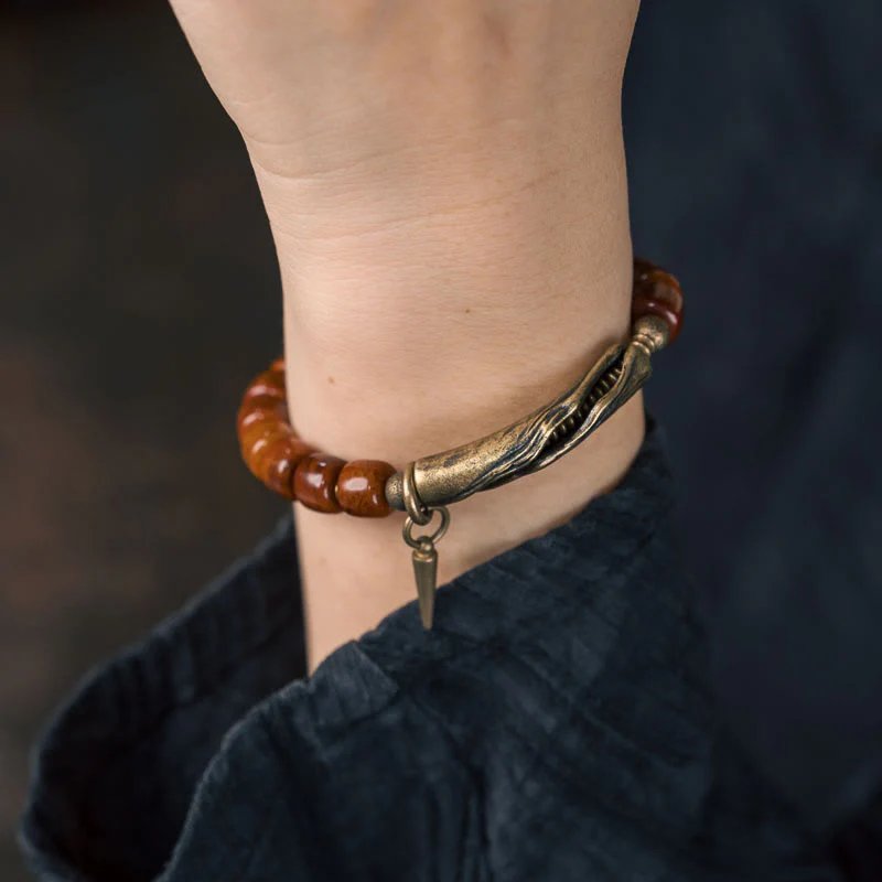 Buddha Stones Bone Beads Copper Cone Pendant Strength Bracelet