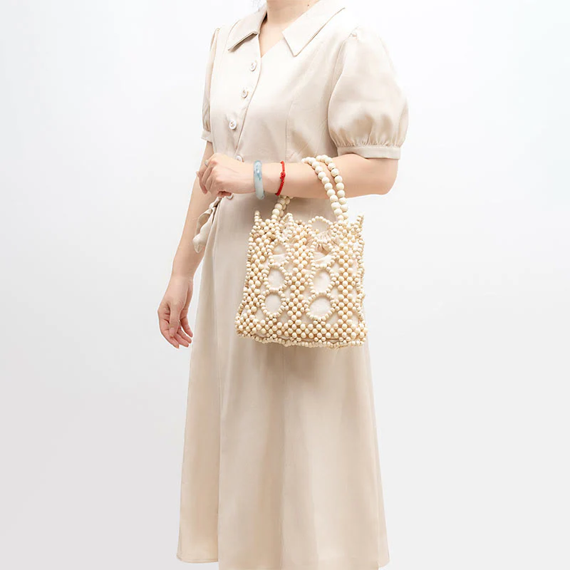 Buddha Stones Hand-woven Round Hollow Wooden Beads Handbag