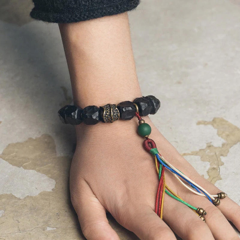 Buddha Stones Tibet Ebony Wood Copper Peace Tassel Wrist Mala Bracelet