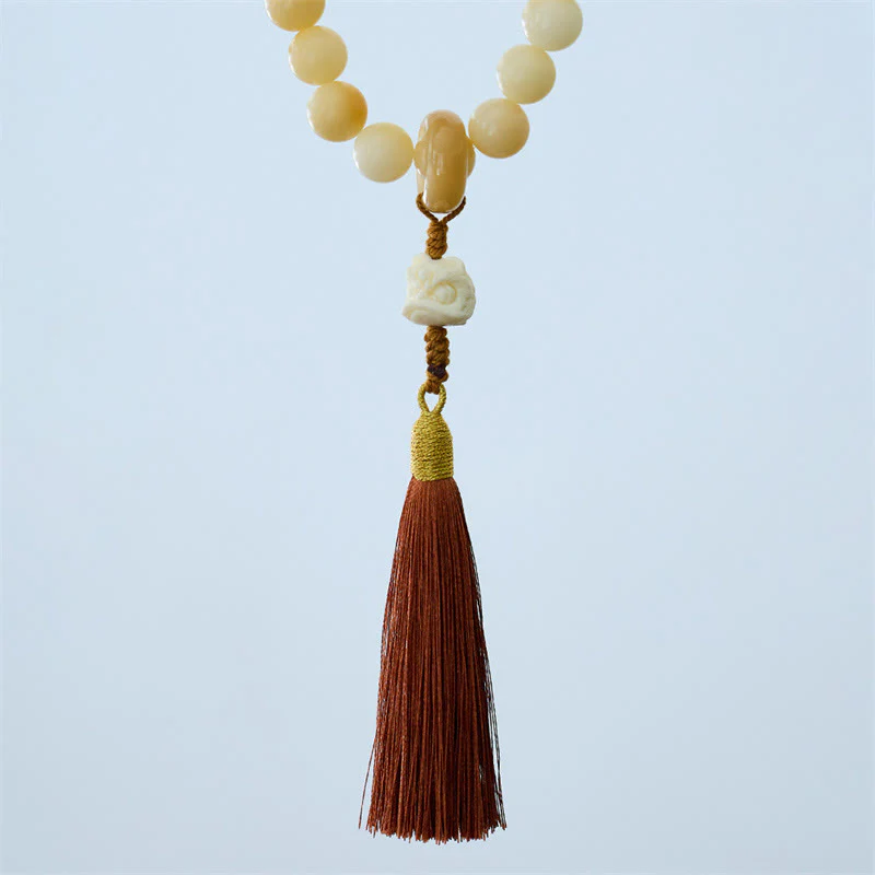 Buddha Stones Natural Bodhi Seed Ivory Fruit Dancing Lion Charm Harmony Tassel Wrist Mala