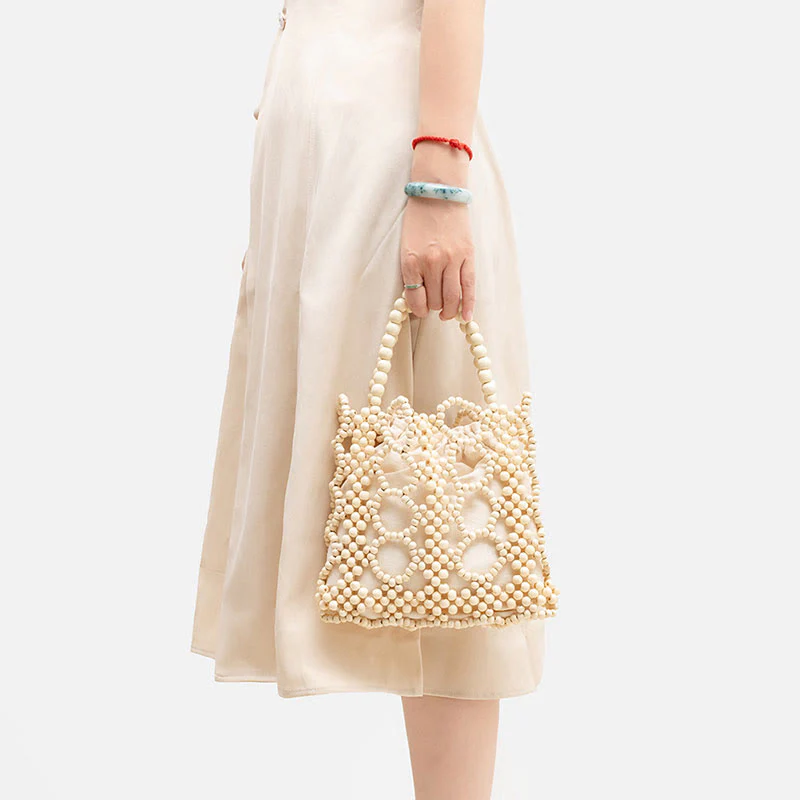 Buddha Stones Hand-woven Round Hollow Wooden Beads Handbag