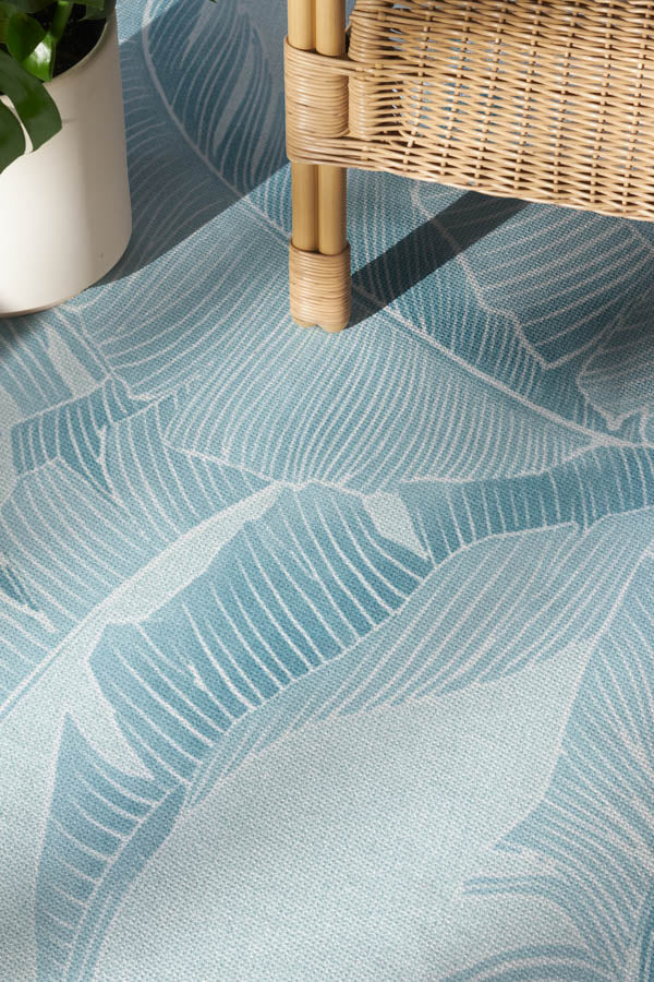 Banana Leaf Soft Blue Outdoor Rug by Gray Malin