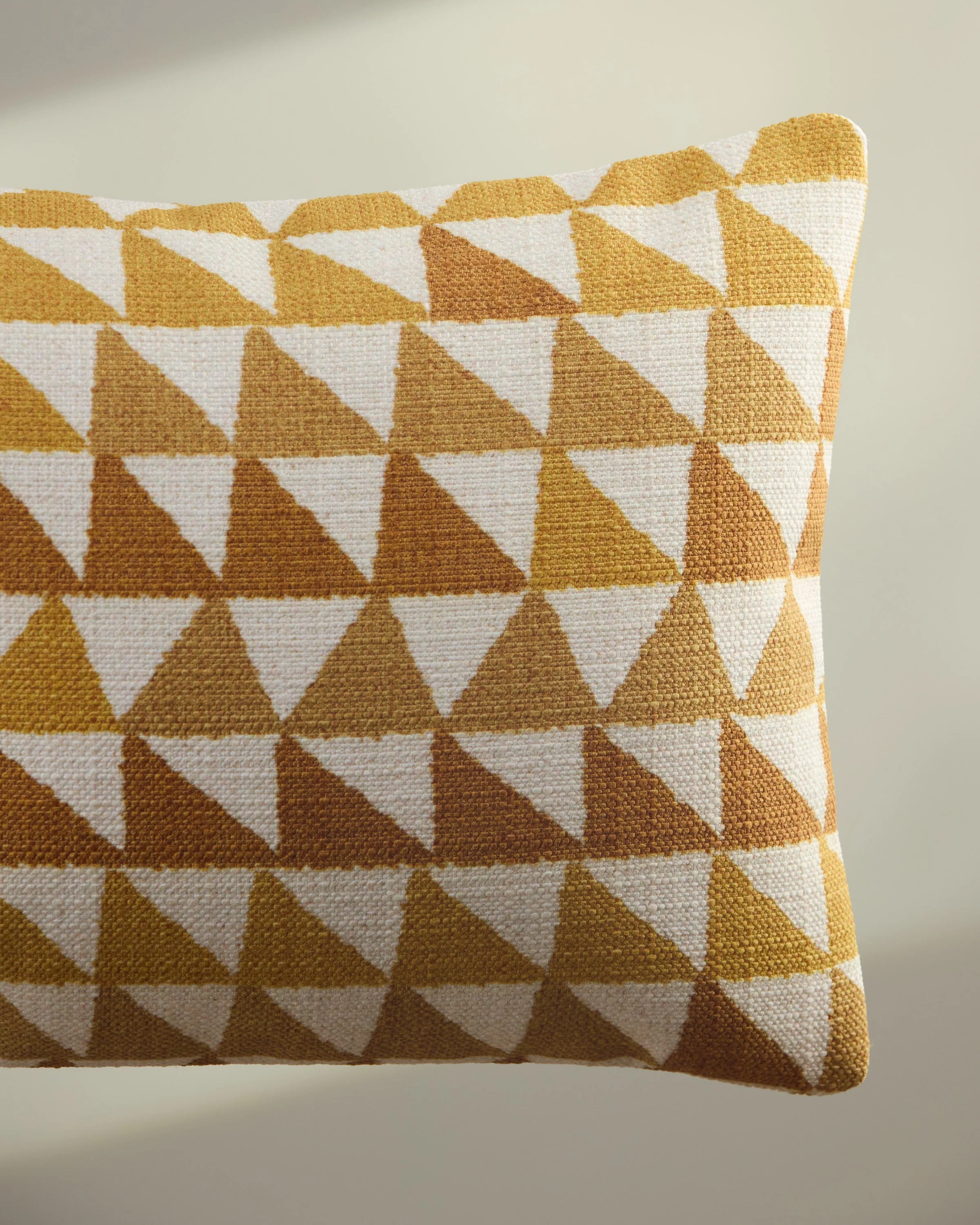 Miya Ochre Woven Throw Pillow by Justina Blakeney