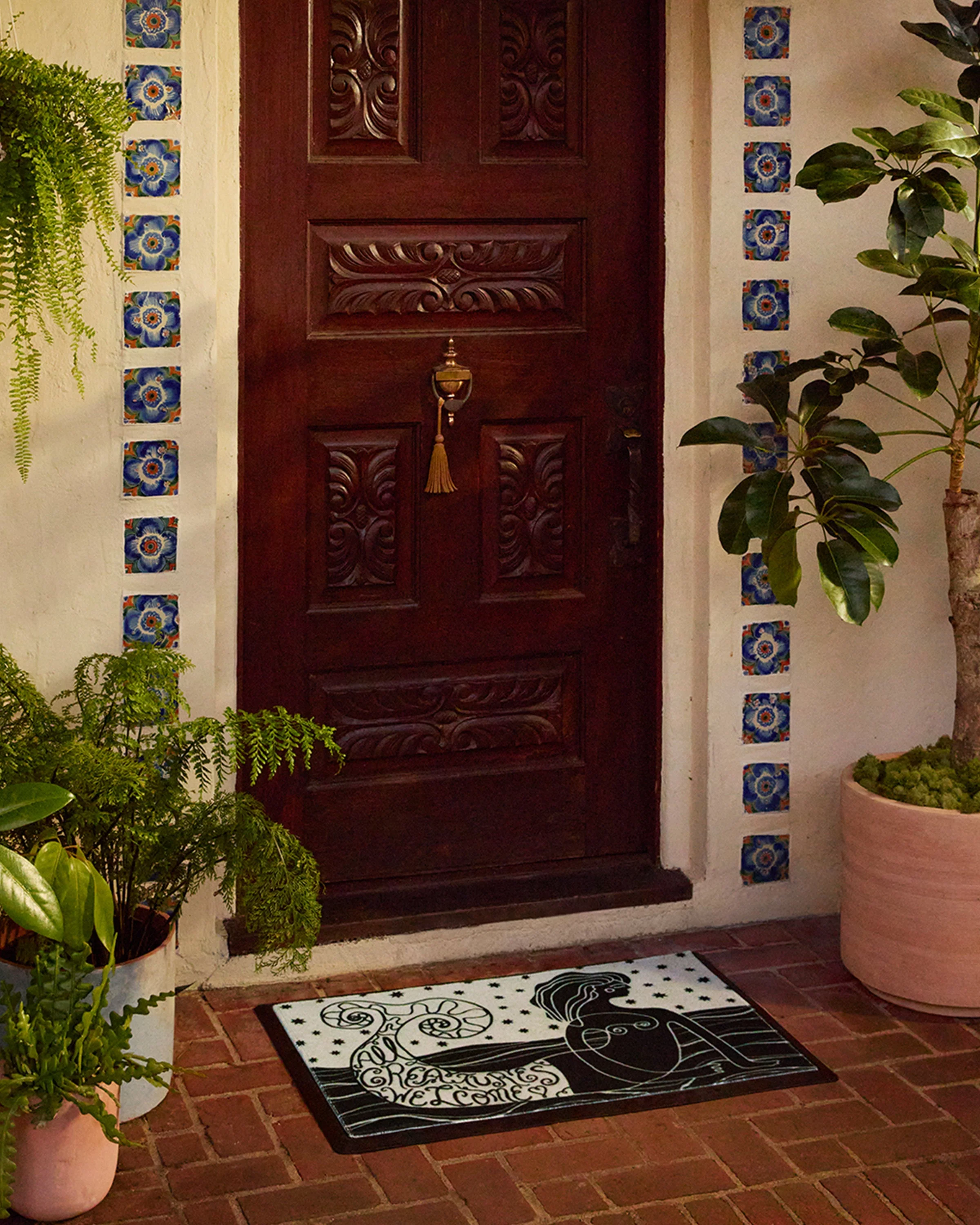 All Creatures Welcome Doormat by Justina Blakeney