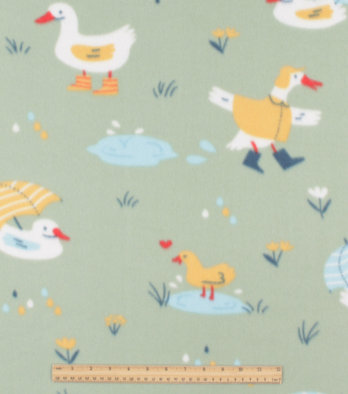 Playing in the Rain on Green Blizzard Fleece Fabric