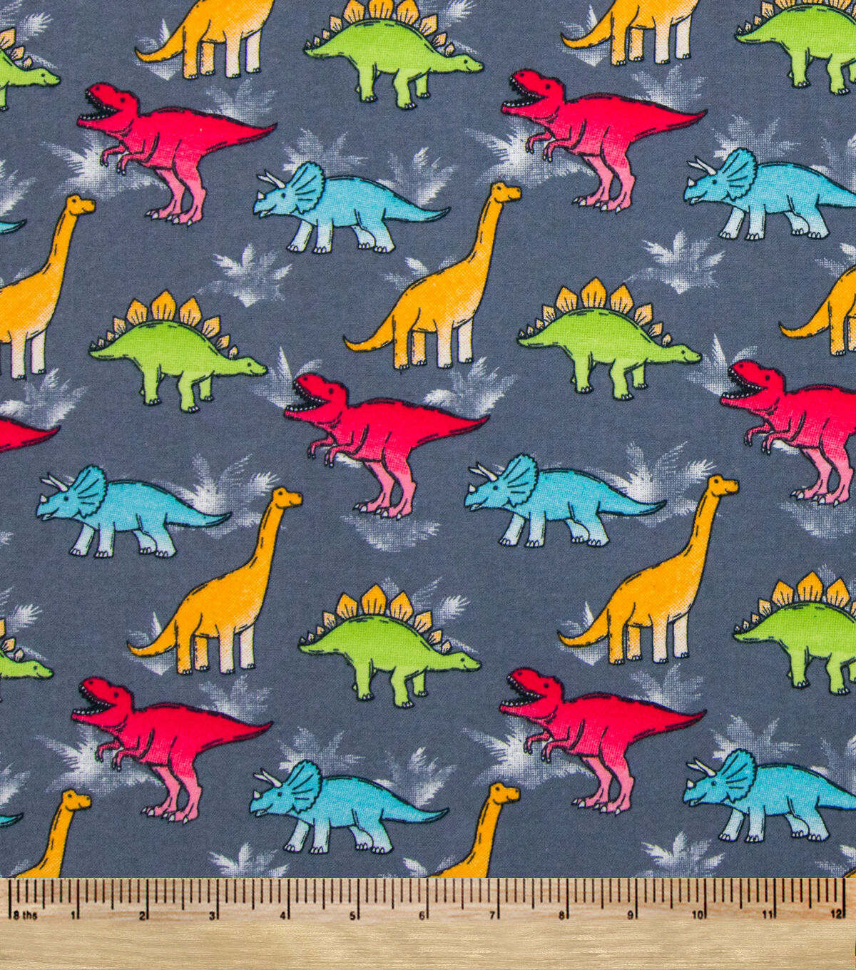 Bright Dinos on Gray Super Snuggle Flannel Fabric