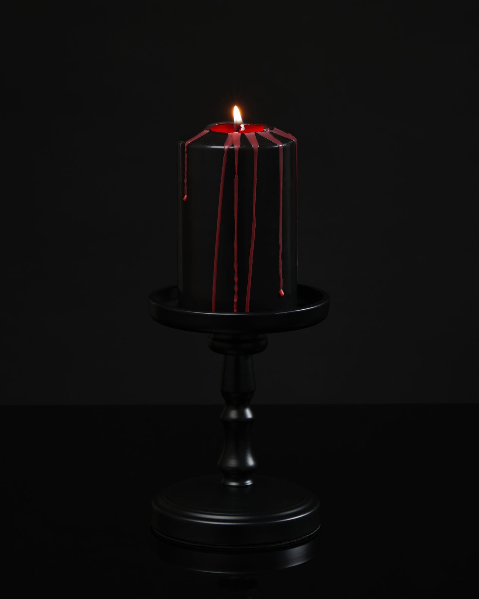 Bleeding Pillar Candle Black & Red Unscented