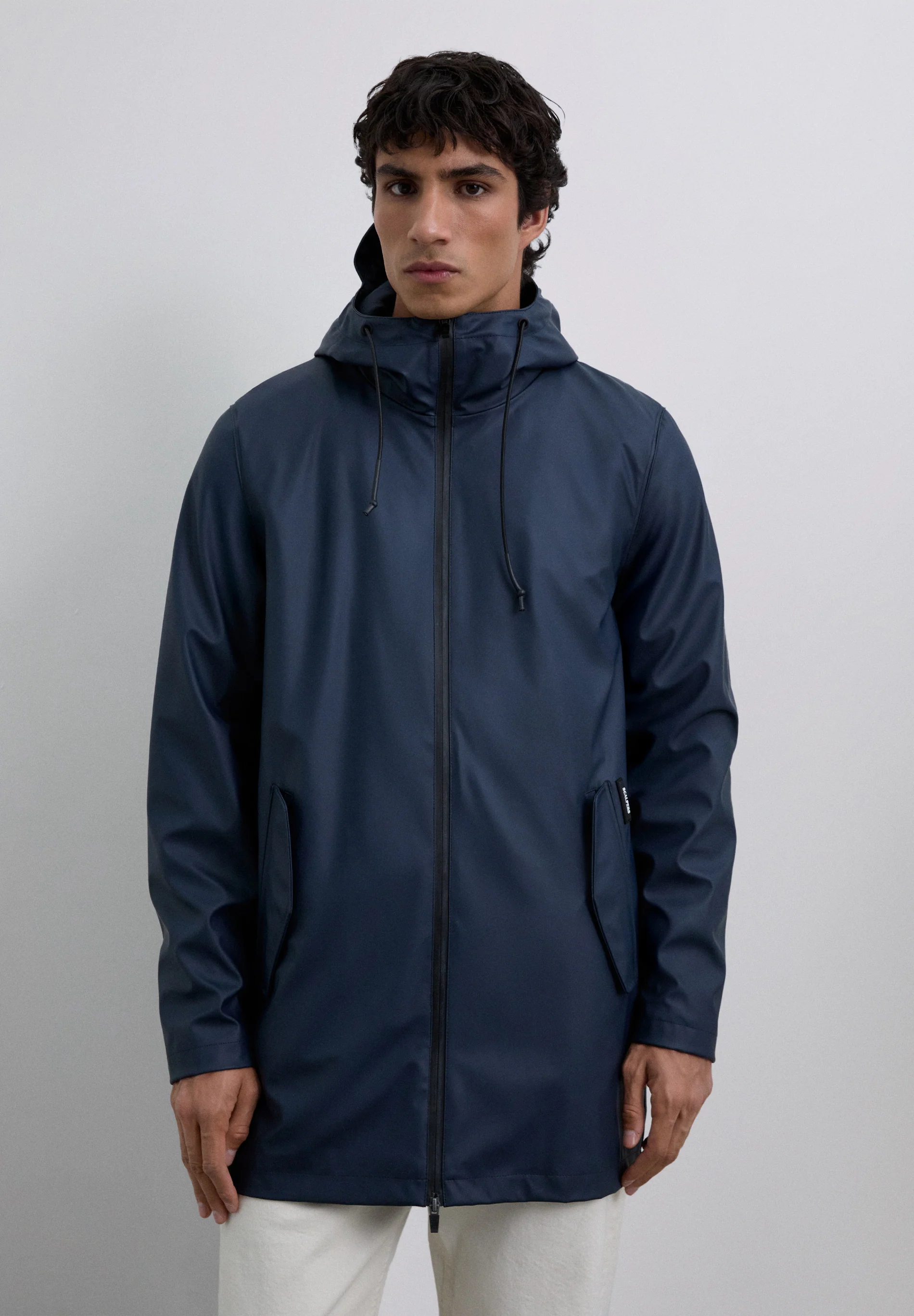 CHAQUETA IMPERMEABLE LOGO