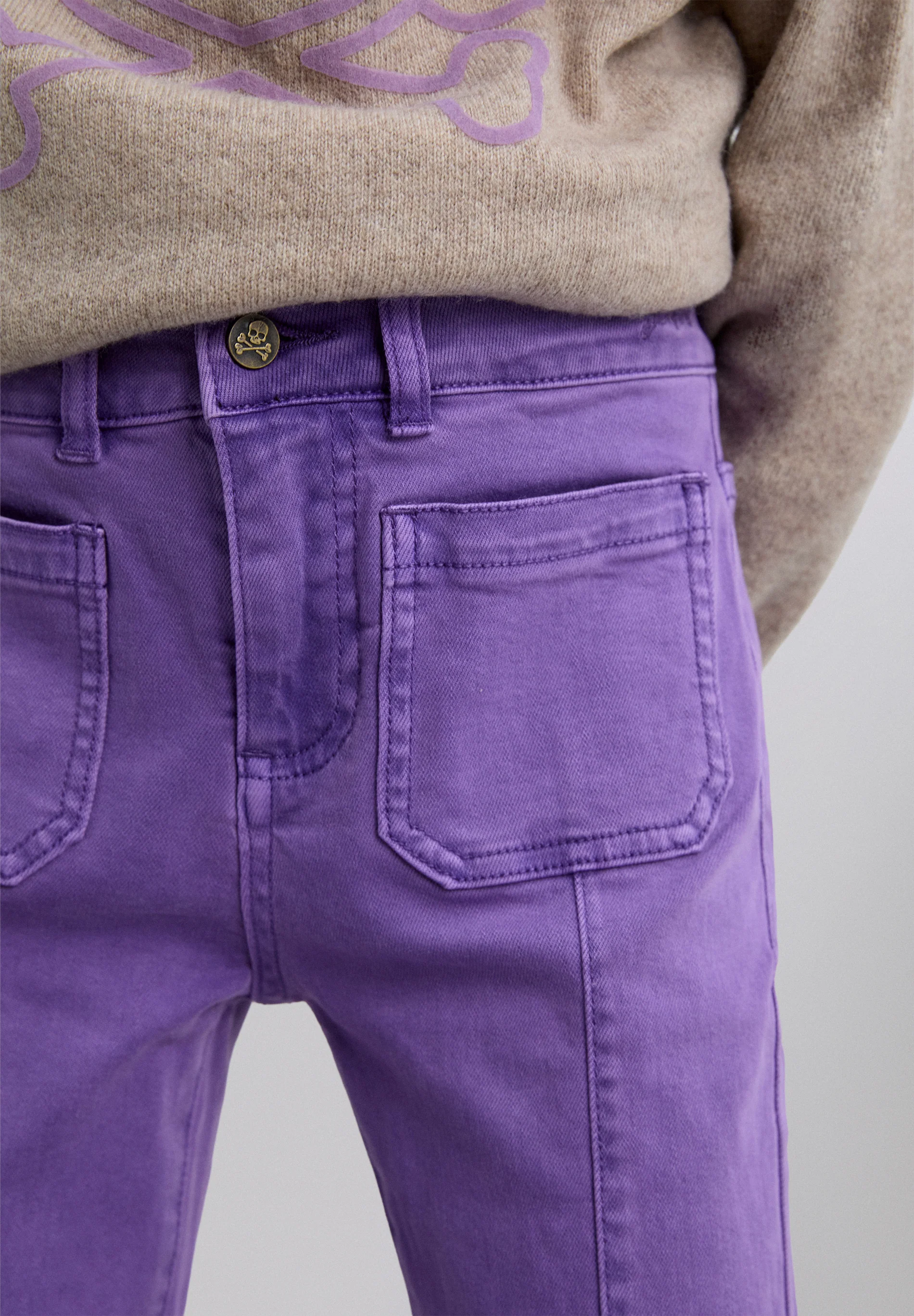 PANTALÓN FLARE FLECOS