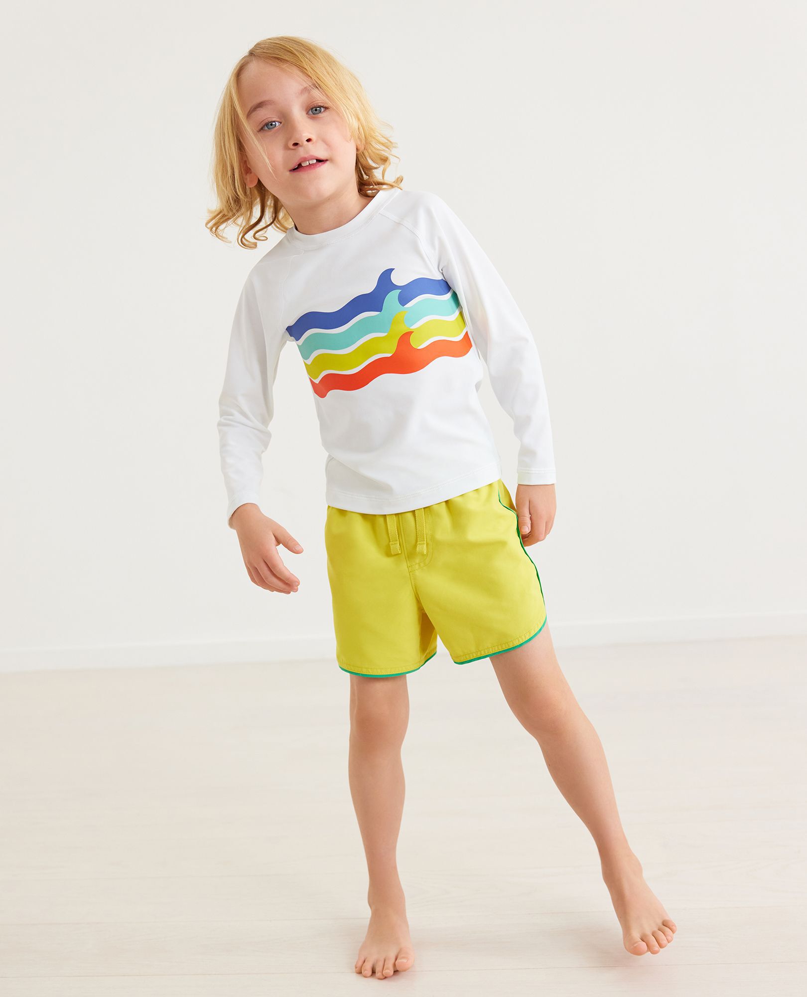 Solid Dolphin Vent Swim Trunks
