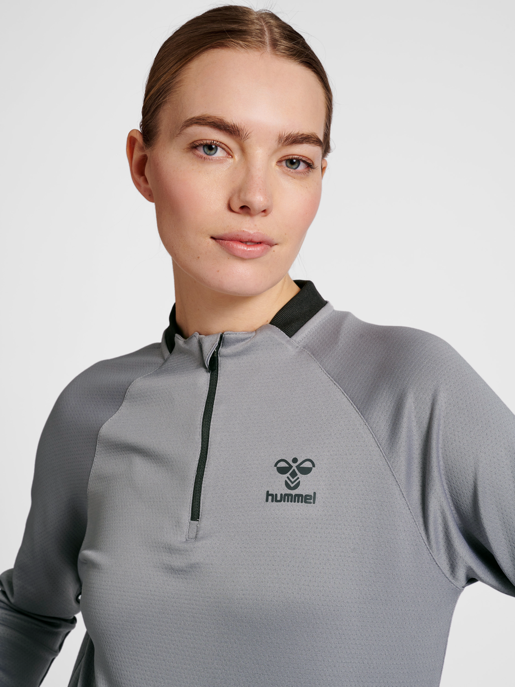 hmlGG12 ACTION HALF ZIP SWEAT WOMAN
