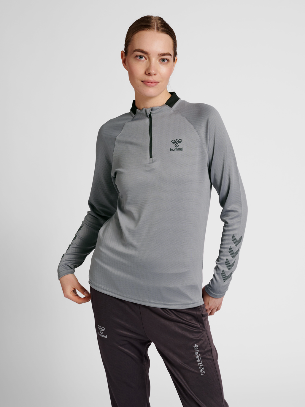 hmlGG12 ACTION HALF ZIP SWEAT WOMAN
