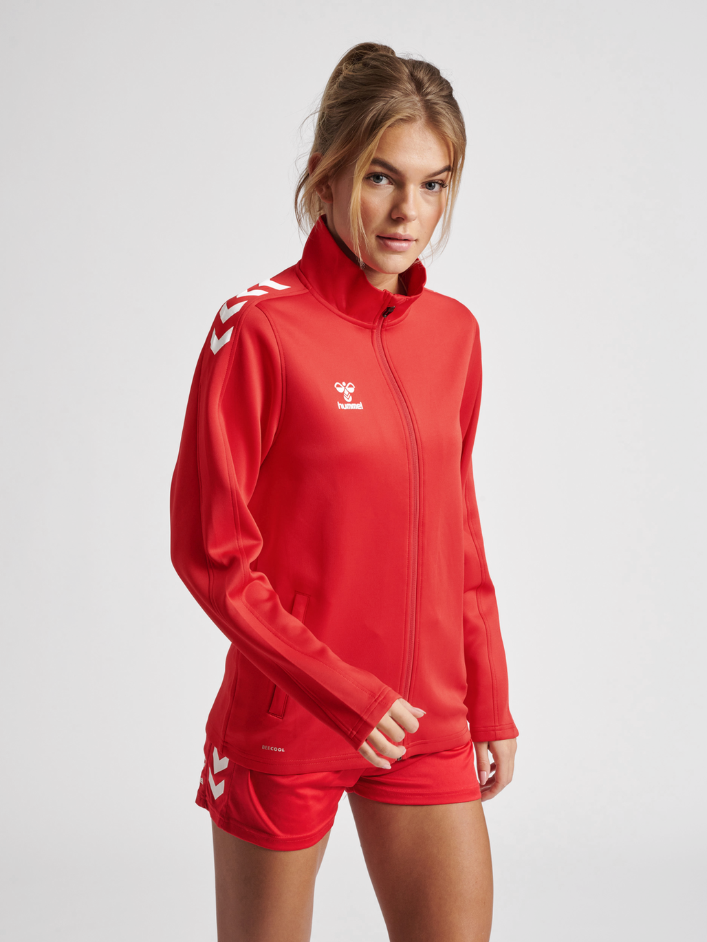 hmlCORE XK POLY ZIP SWEAT WOMAN