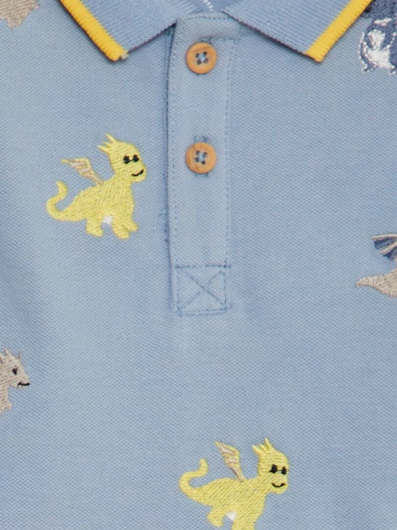 Polo à broderies dino bleu