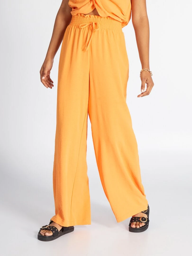 Pantalon large en maille satinée orange