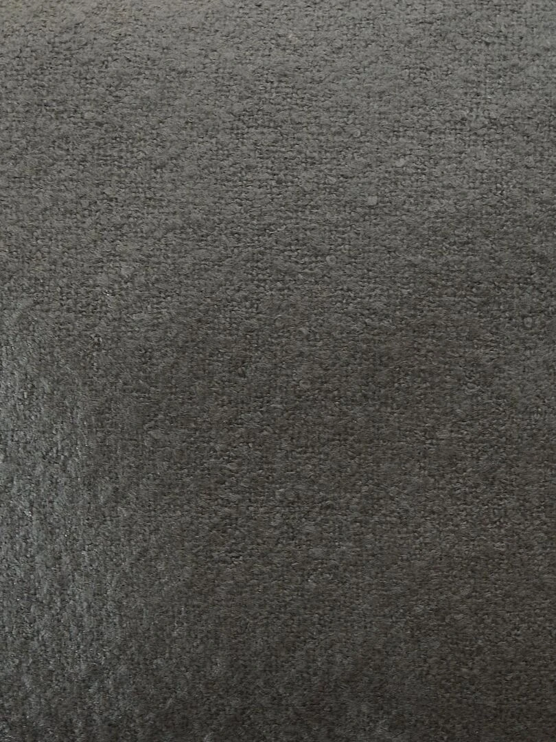 Coussin Effet laineux à pompons gris anthracite