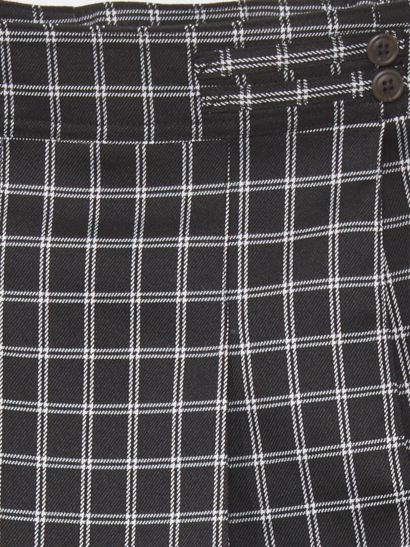 Jupe courte à carreaux   Noir à carreaux