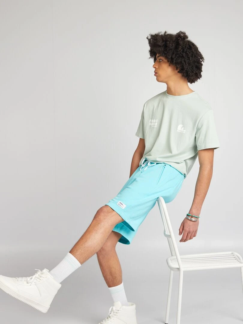 Short en molleton avec poches zippées bleu turquoise