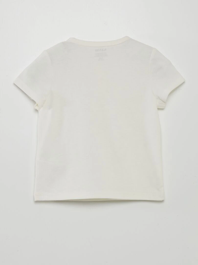 Tee shirt uni avec col boutonné blanc