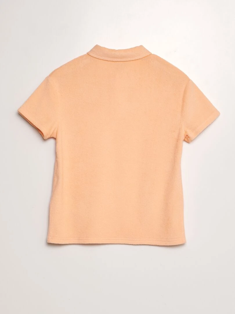 Polo uni en éponge   Orange