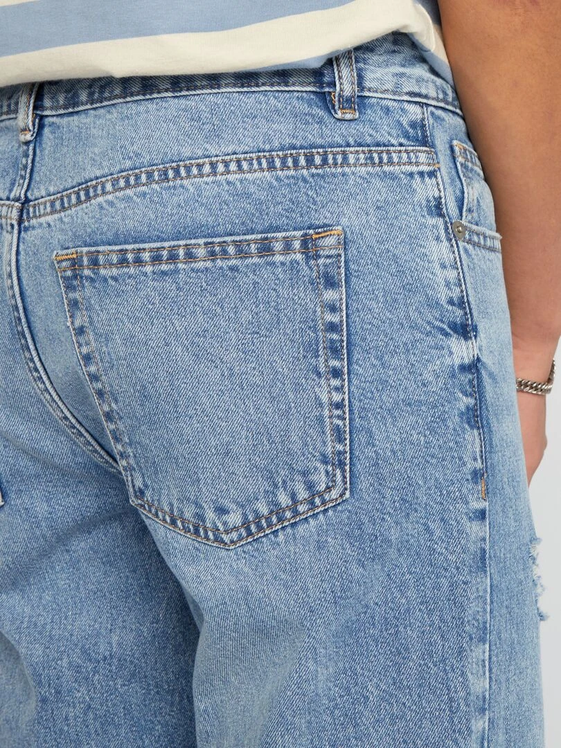 Jean large avec abrasions   Bleu