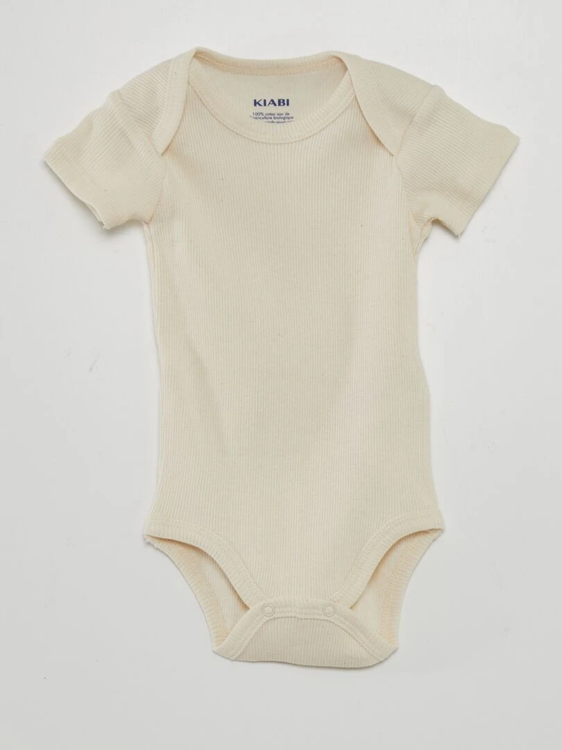 7 bodies unis + pochon de rangement   Beige