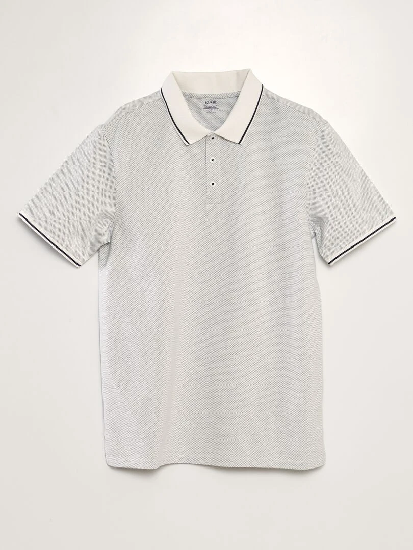 Polo en piqué de coton effet moucheté blanc
