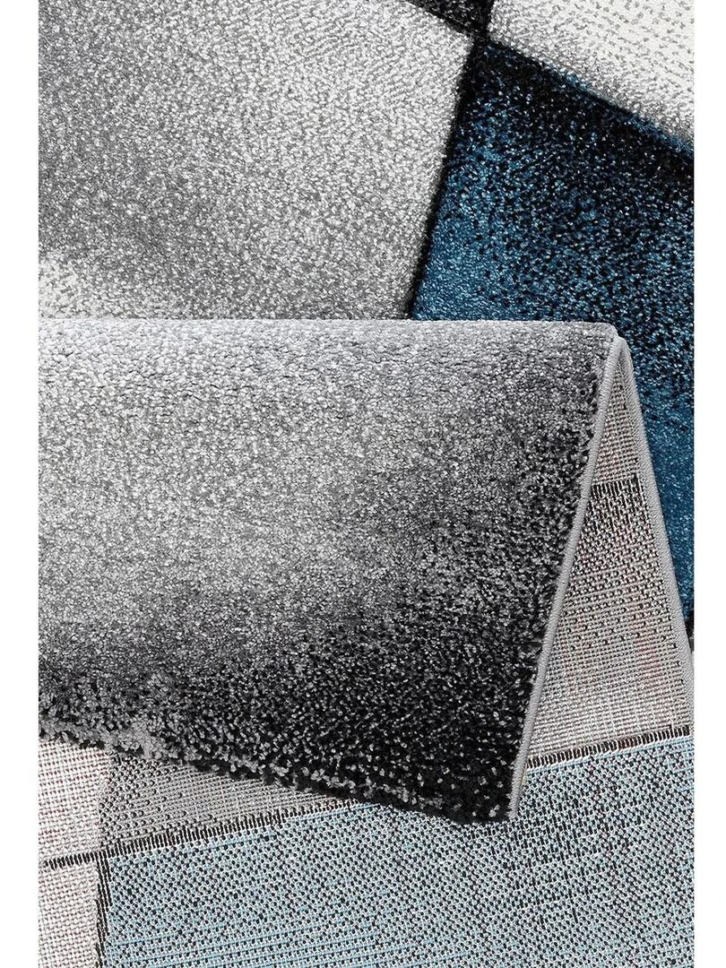 Tapis géométrique et asymétrique Bleu turquoise