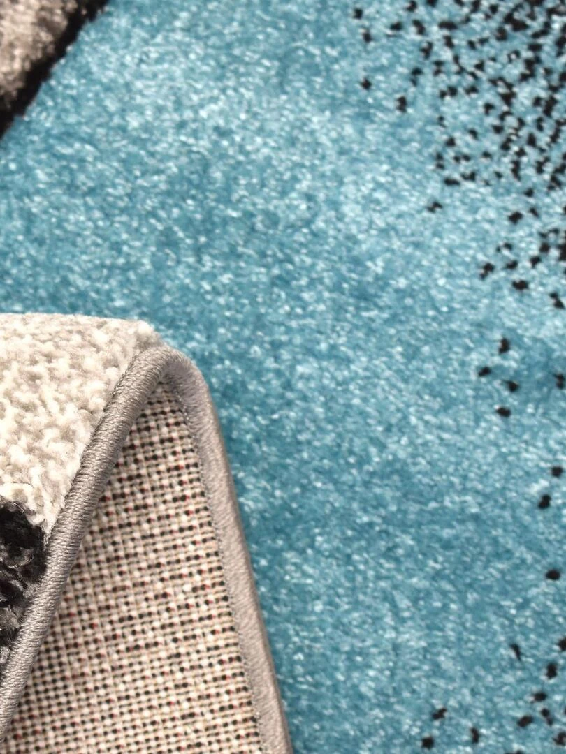 Tapis géométrique et asymétrique   Bleu turquoise