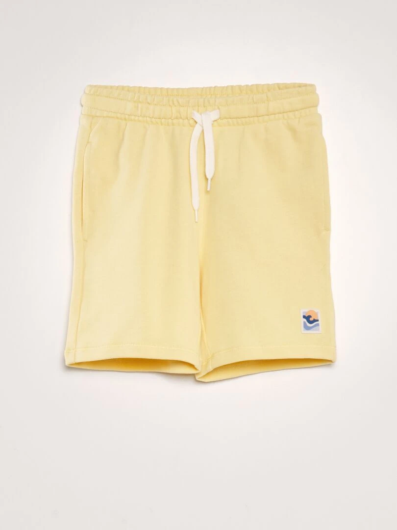 Bermuda en french terry style surf Jaune