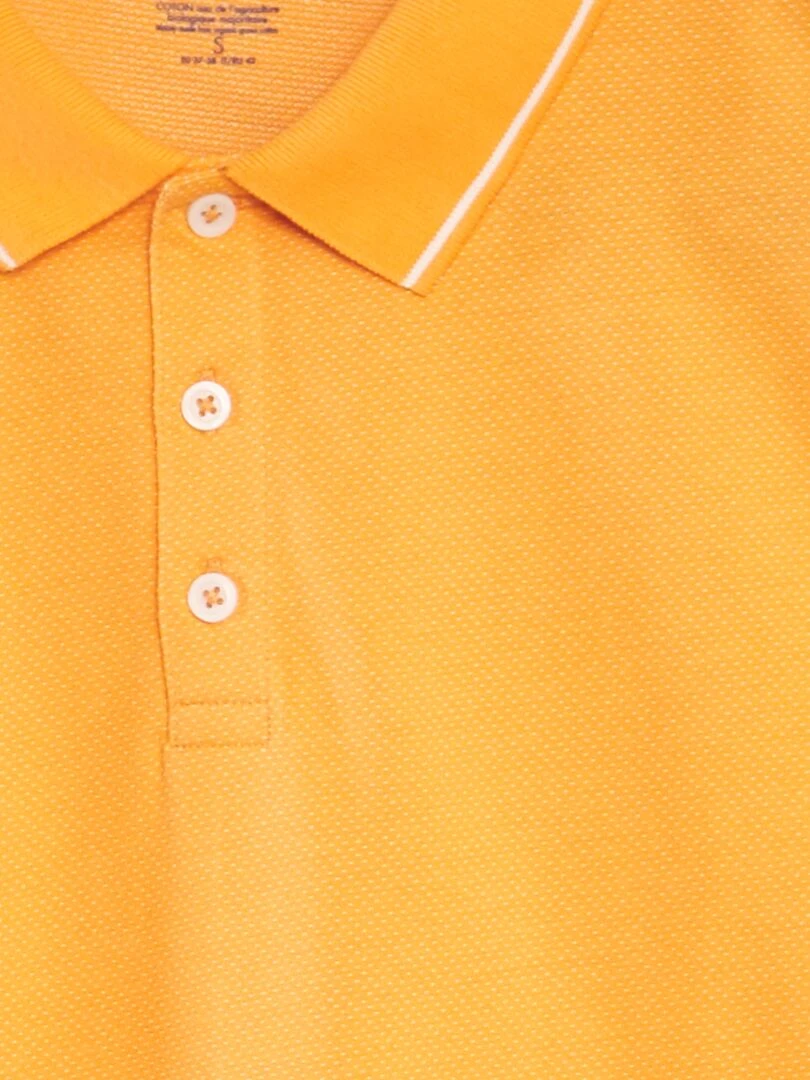 Polo en piqué de coton effet moucheté   Orange