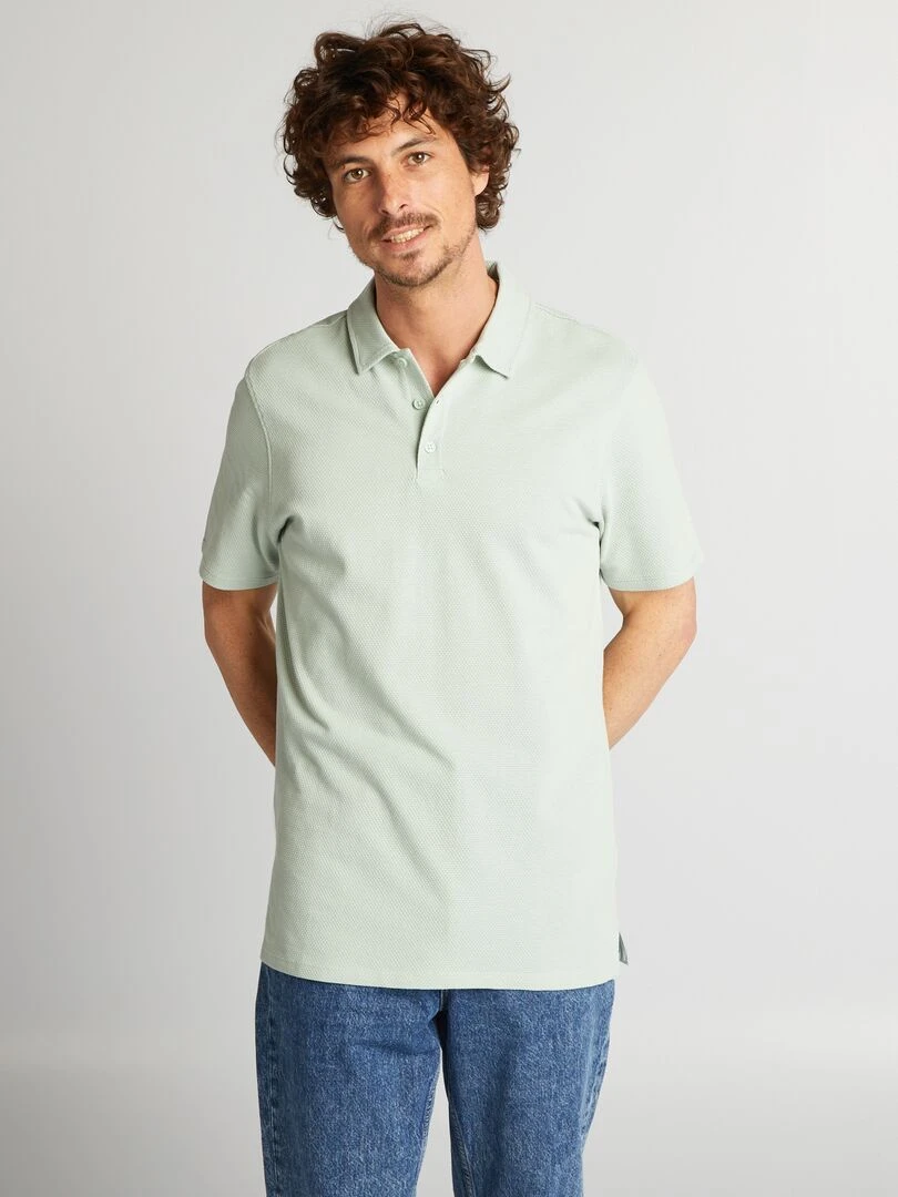 Polo uni texturé bleu