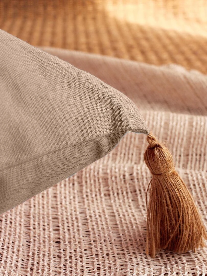 Coussin avec pompons en jute Beige