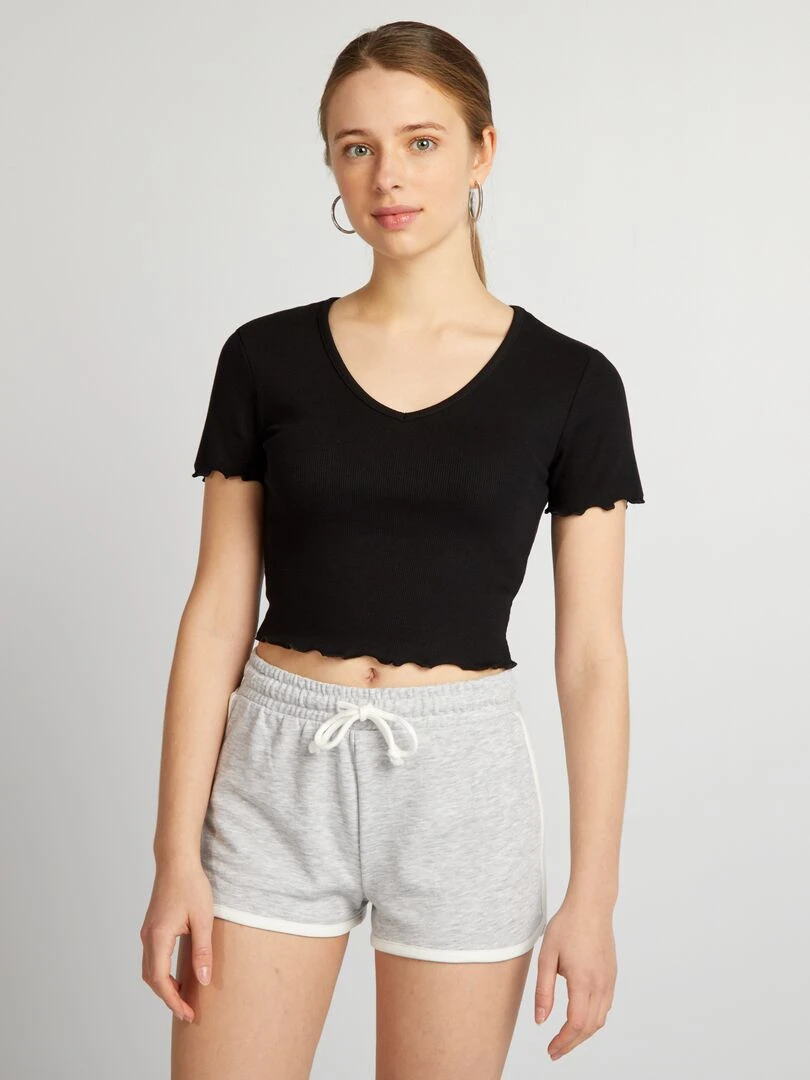 Crop top à bords ondulés noir