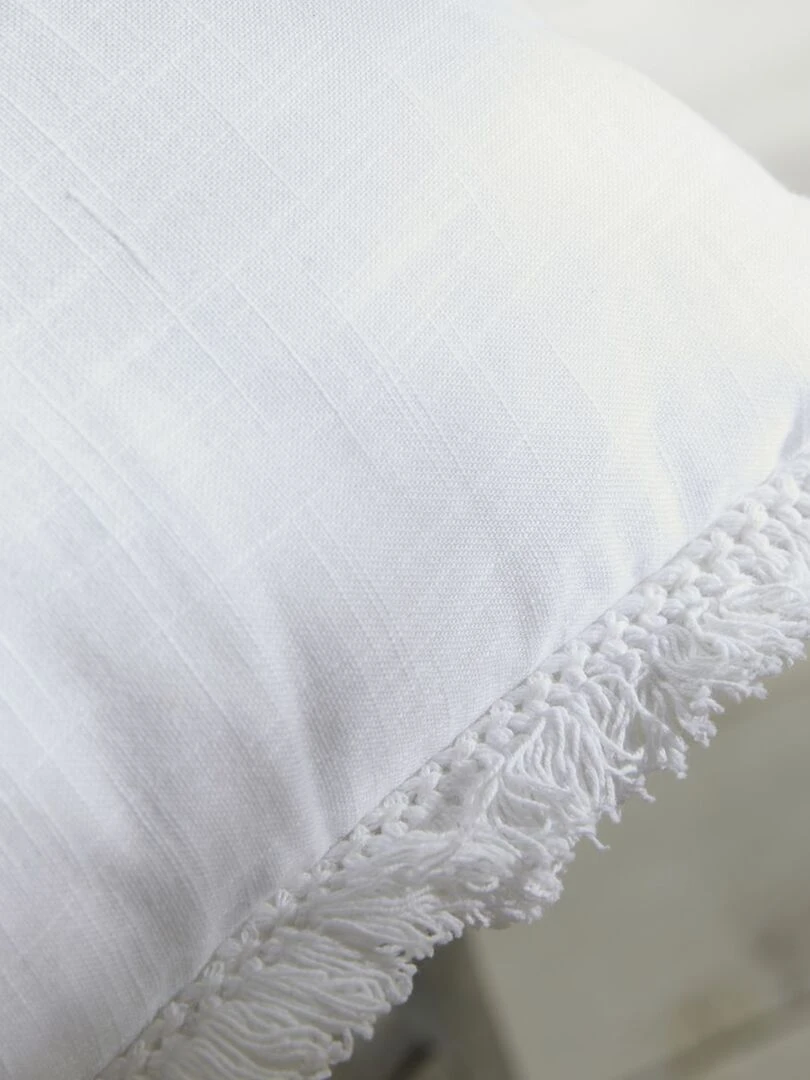 Coussin brodé blanc