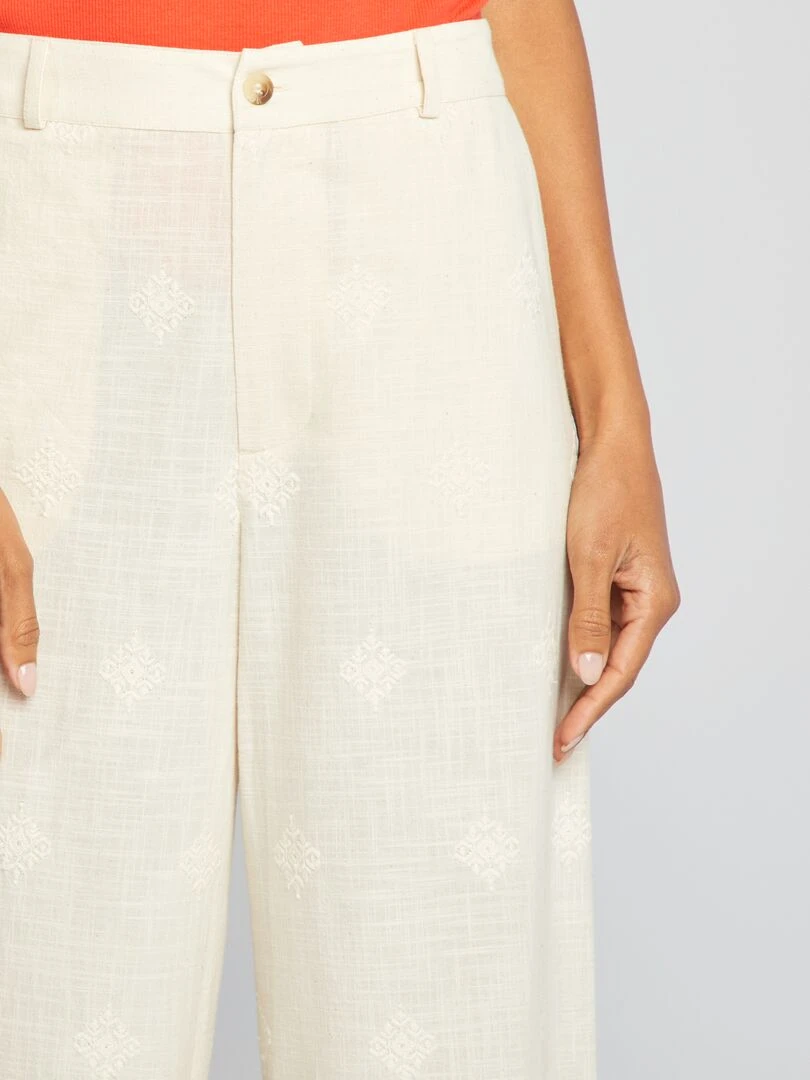 Pantalon large avec motifs brodés   Beige
