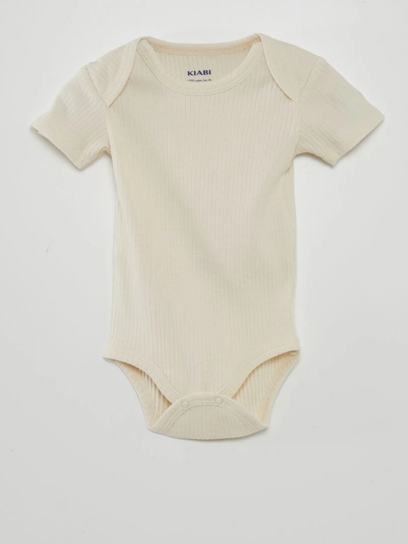 7 bodies unis + pochon de rangement   Beige