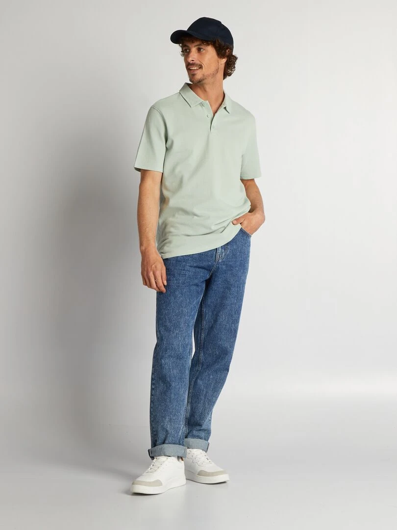 Polo uni texturé bleu