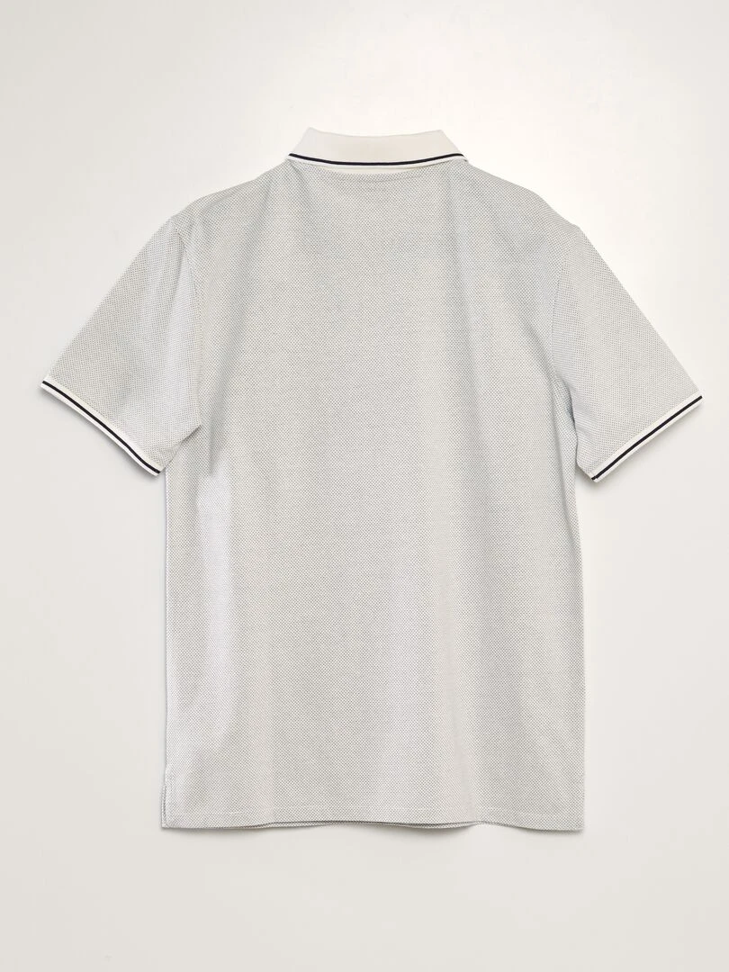 Polo en piqué de coton effet moucheté blanc