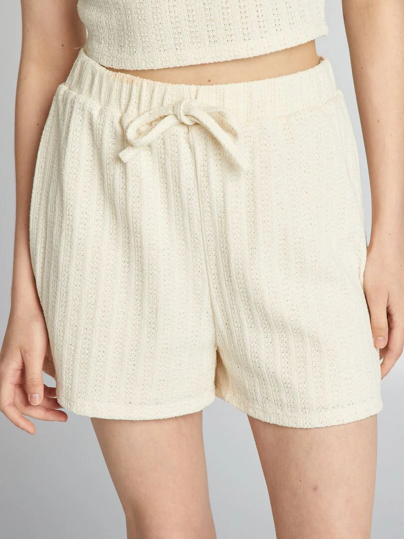 Short en matière ajourée Beige