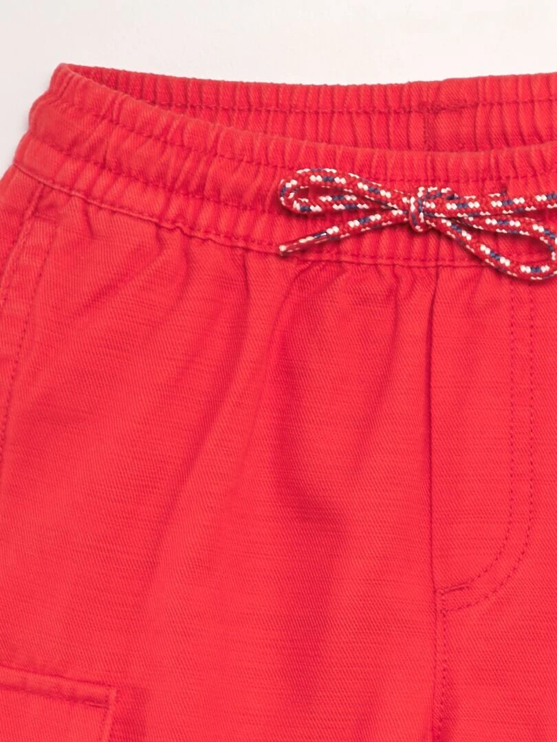 Short avec poches sur les côtés   Rouge