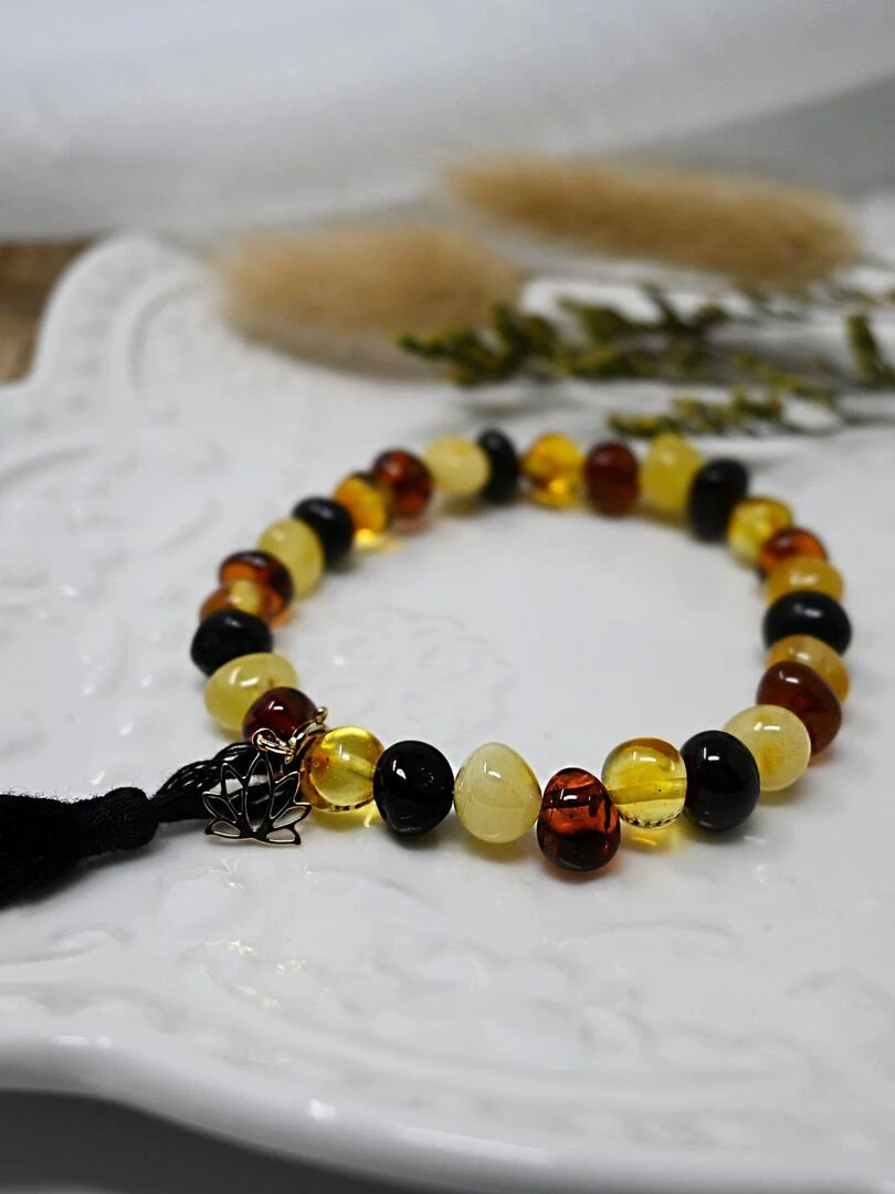 Bracelet adulte Ambre multicolore pompon noir et lotus or Multicolore