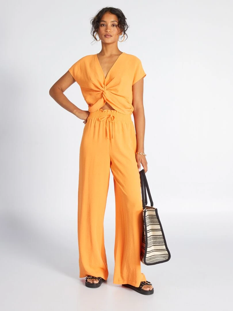 Pantalon large en maille satinée orange