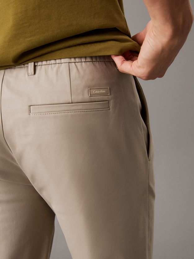 Tapered Pleated Chino Trousers
