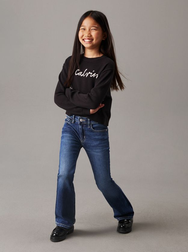 Mid Rise Flared Jeans