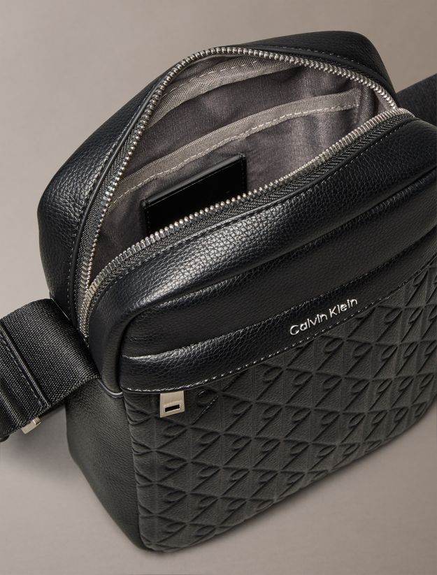 Embossed Allover Monogram Reporter Bag