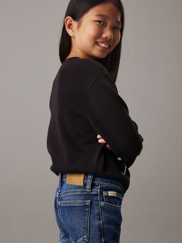 Mid Rise Flared Jeans