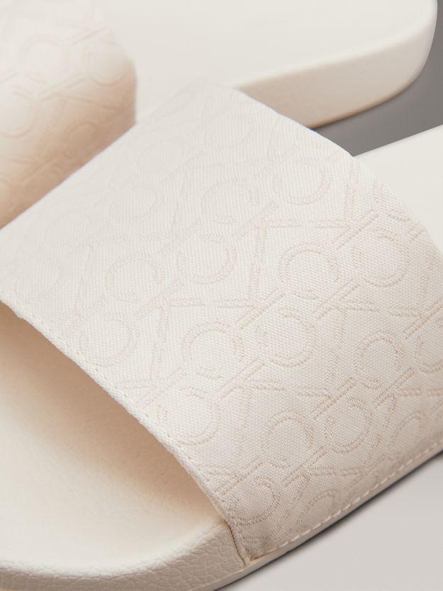 Logo Jacquard Sliders