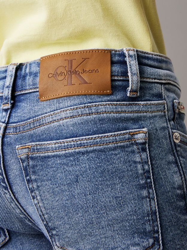 Mid Rise Flared Jeans