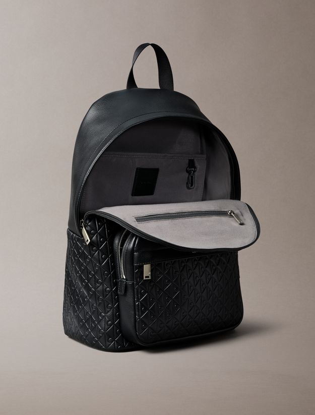Embossed Allover Monogram Backpack